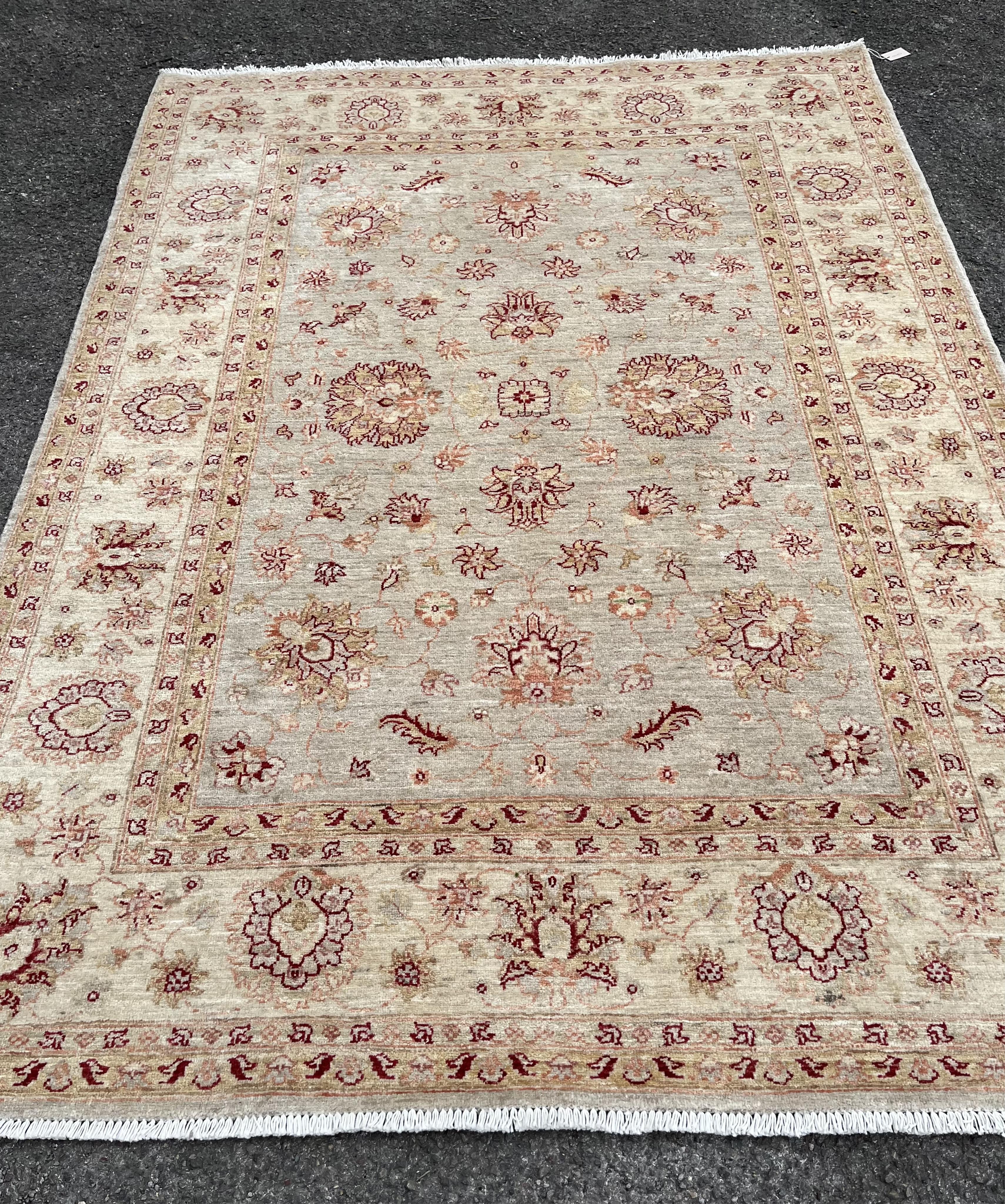A Ziegler style ivory ground carpet, 240 x 173cm. Condition - good